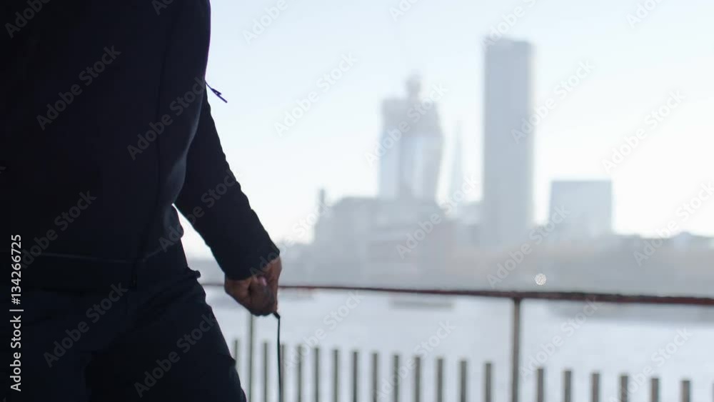 4K Anonymous athletic man skipping in the city 4K Anonymous athletic man skipping in the city