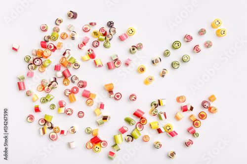lollipops, candy pattern, top view flat lay on colorful background