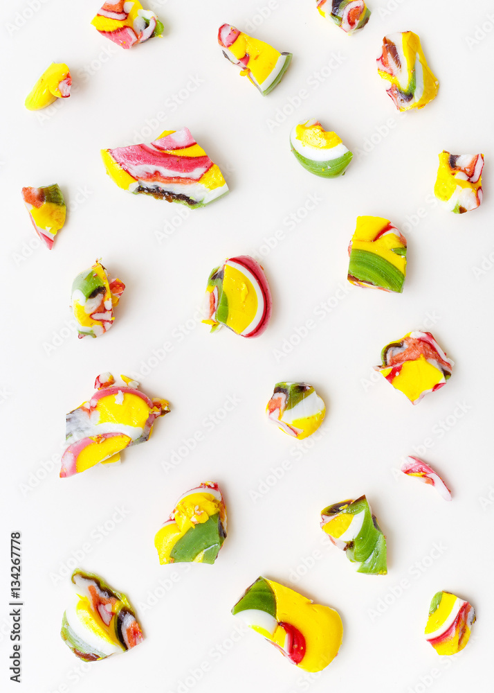 Fototapeta premium lollipops, candy pattern, top view flat lay on colorful backgrou