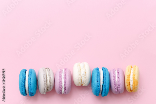 Wallpaper Mural Macarons cake, top view flat lay, handmade pattern on pink background Torontodigital.ca