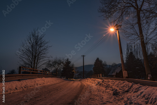 Night winter in Libouchec village photo