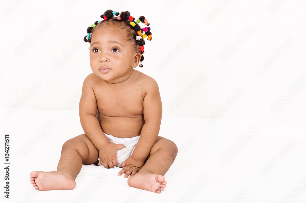 Pretty baby sitting in layers isolated on white background. Pretty baby sitting in layers isolated on white background.