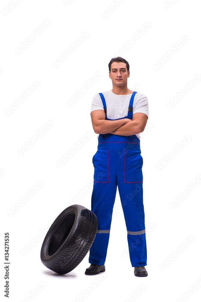 Handsome tyre repairman isolated on white Handsome tyre repairman isolated on white