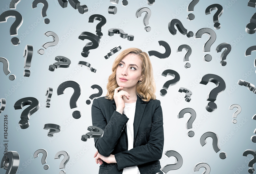 Red haired woman and question marks Red haired woman and question marks