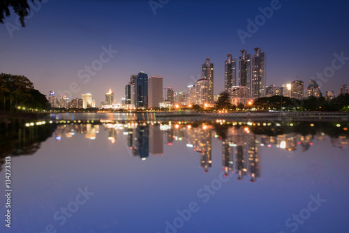 Cityscape bangkok residece and office Tower reflection at night time © VIEWFOTO STUDIO