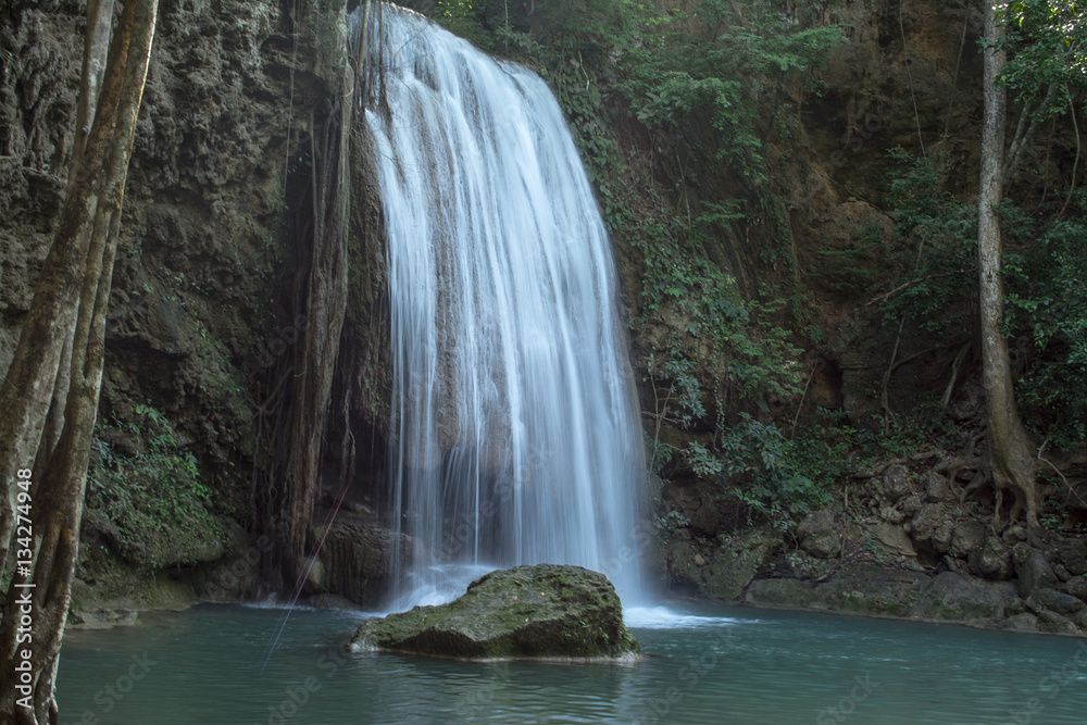 Fototapeta premium Erawan Falls are big and beautiful in Kanchanaburi Province Thailand has a large garden with beautiful trees. 