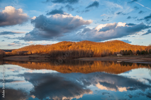 Mountain Water Reflection on Lake During Sunset