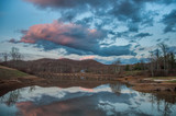 Mountain Water Reflection on Lake During Sunset