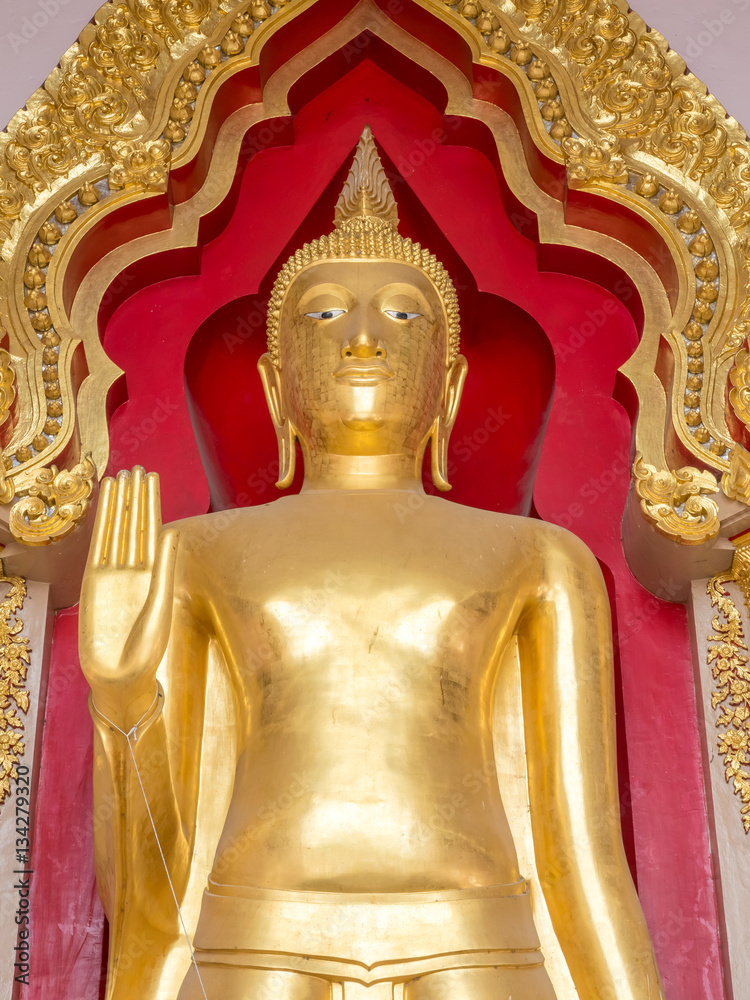 Fototapeta premium Famous standing buddha statue in Thailand