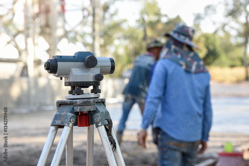 Surveyor equipment tacheometer or theodolite outdoors at construction site