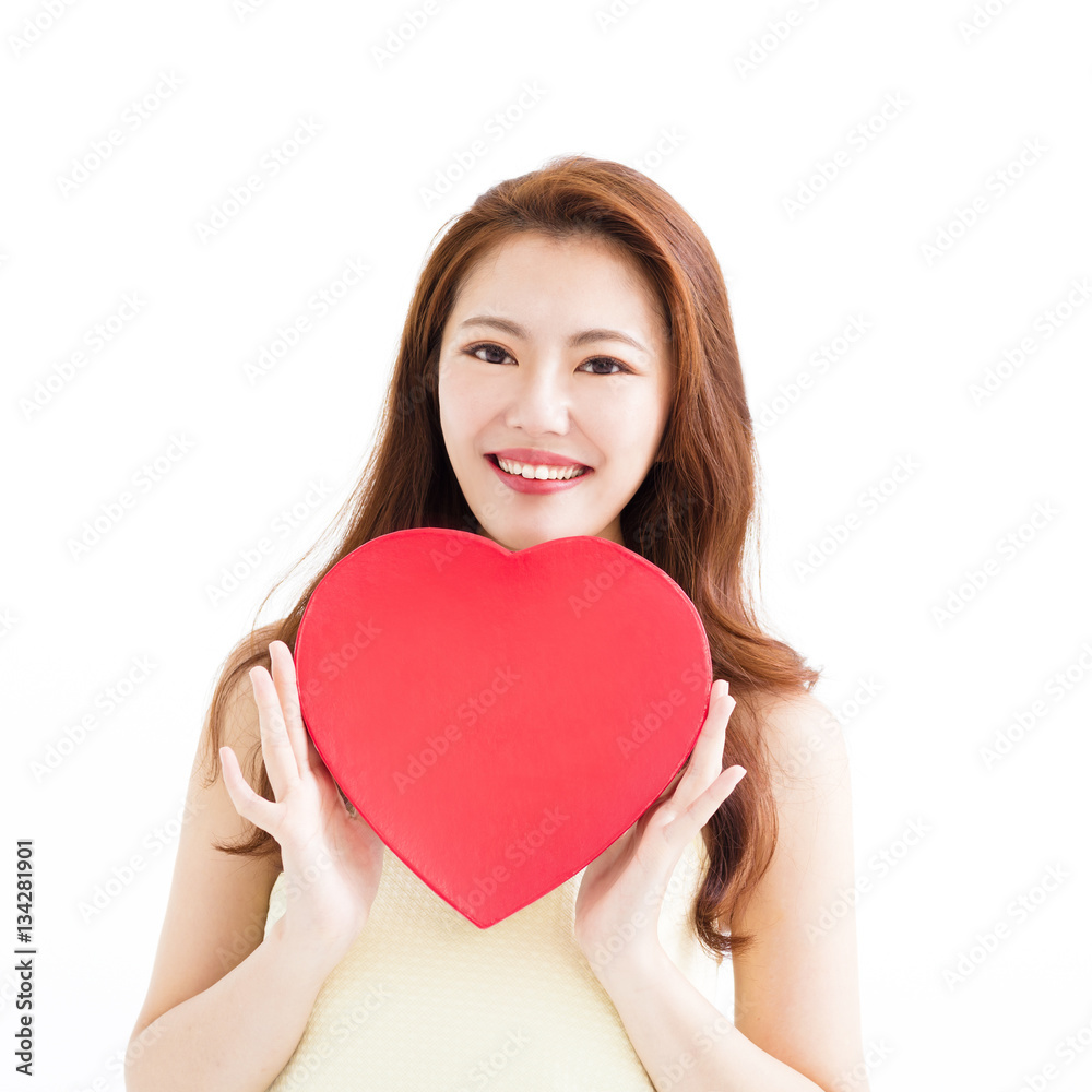 Beautiful woman in love and holding heart shape Beautiful woman in love and holding heart shape