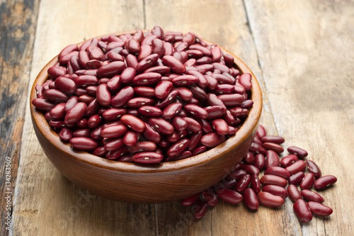 Grains kidney bean in wooden bowl