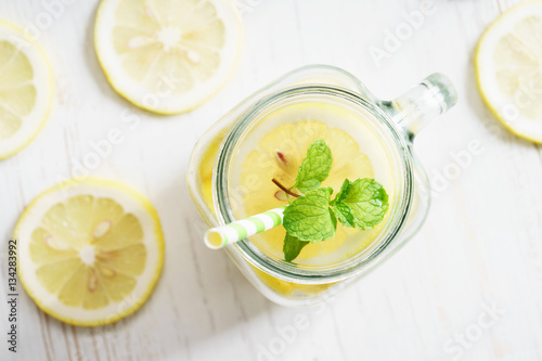 lemonade in jar with green straw