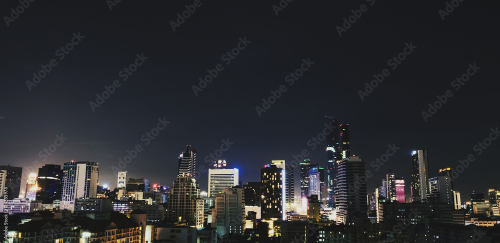 City view modern building at night in Bangkok city, Thailand