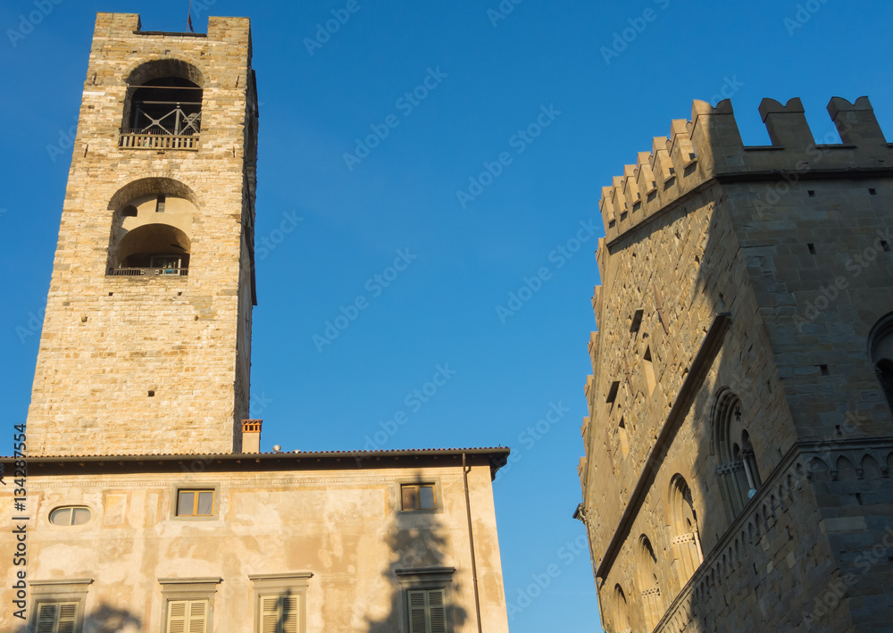 Bergamo - Old city (Citta Alta). One of the beautiful city in Italy. Lombardia. The clock tower called Il Campanone (the big bell) during a wonderful blue sky.