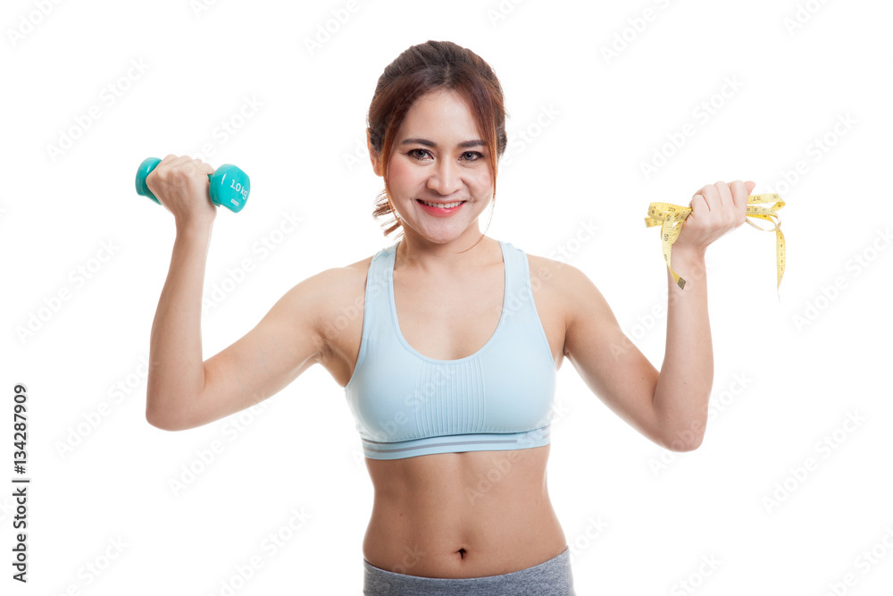 Beautiful Asian healthy girl with dumbbell and measuring tape. Beautiful Asian healthy girl with dumbbell and measuring tape.