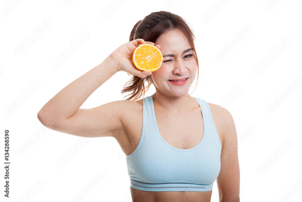 Asian healthy girl on diet with orange fruit. Asian healthy girl on diet with orange fruit.