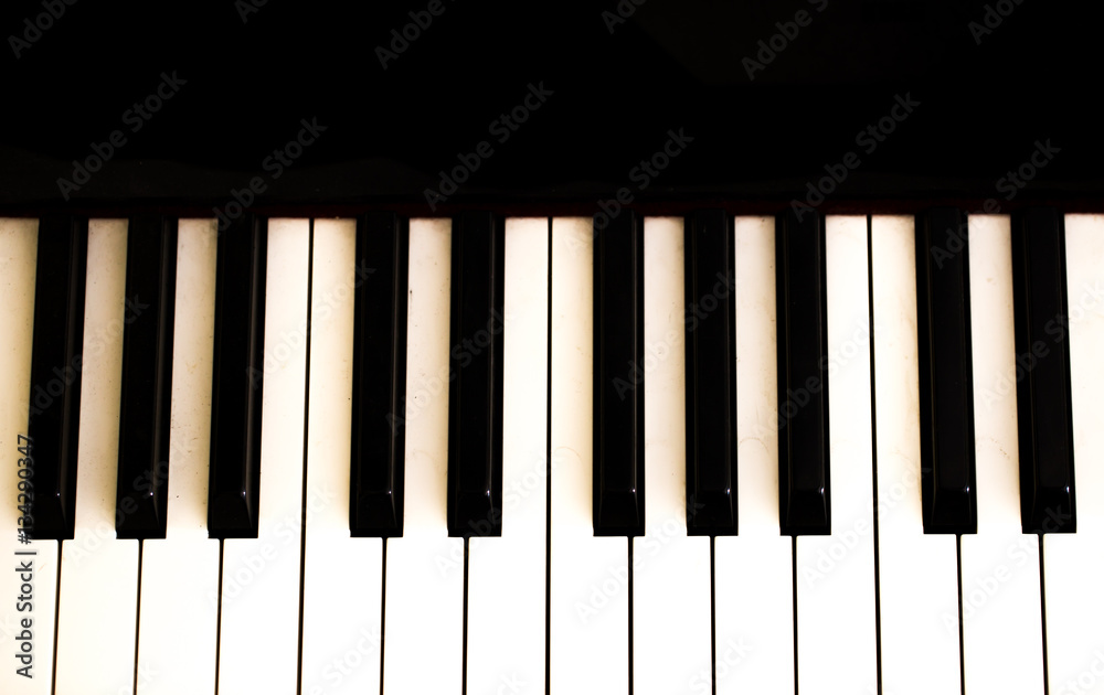 musical instrument, piano keys on black background musical instrument, piano keys on black background