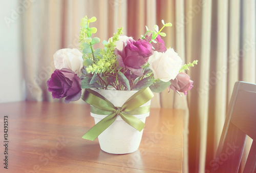 Fake flowers in vase vintag...