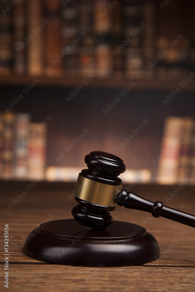 Law books, mallet of the judge, Courtroom background Law books, mallet of the judge, Courtroom background