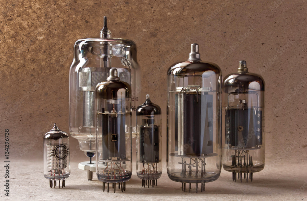 electronic background with vacuum tubes on kraft paper. electronic background with vacuum tubes on kraft paper.