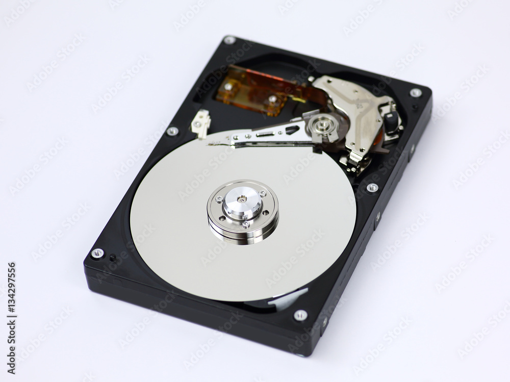 Harddisk drive (HDD) with top cover open isolated on white background Harddisk drive (HDD) with top cover open isolated on white background