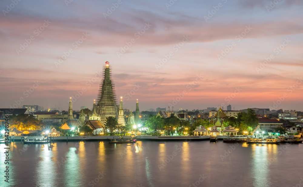 Temple of Dawn pagoda under twilight sky