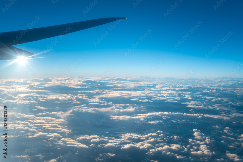 The plane fly on the background of beautiful cloud The plane fly on the background of beautiful cloud