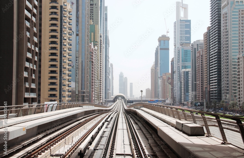 Fototapeta premium Dubai metro the forward movement speed of the skyscrapers