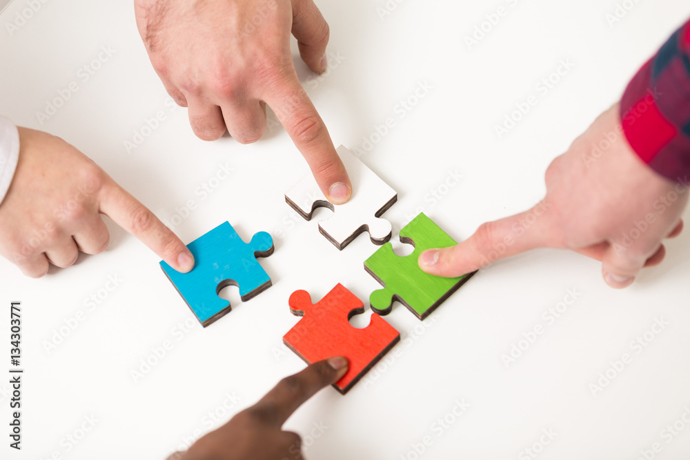 business people group assembling jigsaw puzzle and represent team support business people group assembling jigsaw puzzle and represent team support
