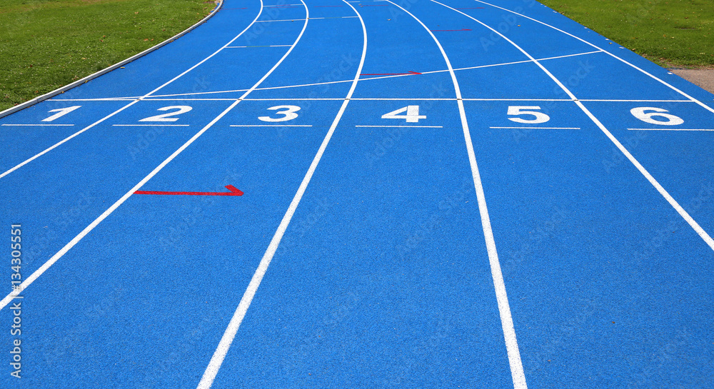 lanes of a athletic track with numbers one two three four five s