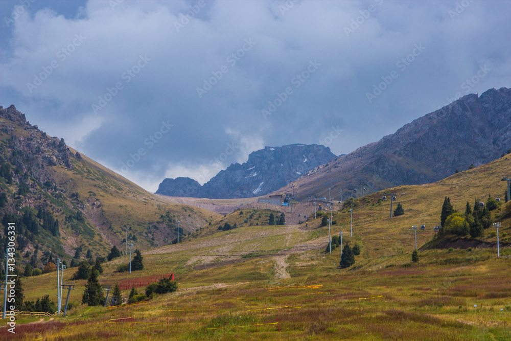 Shymbulak ski resort at early autumn time. Cableway in the mount