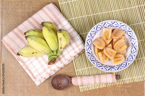 Boiled banana in syrup and wholes of banana.