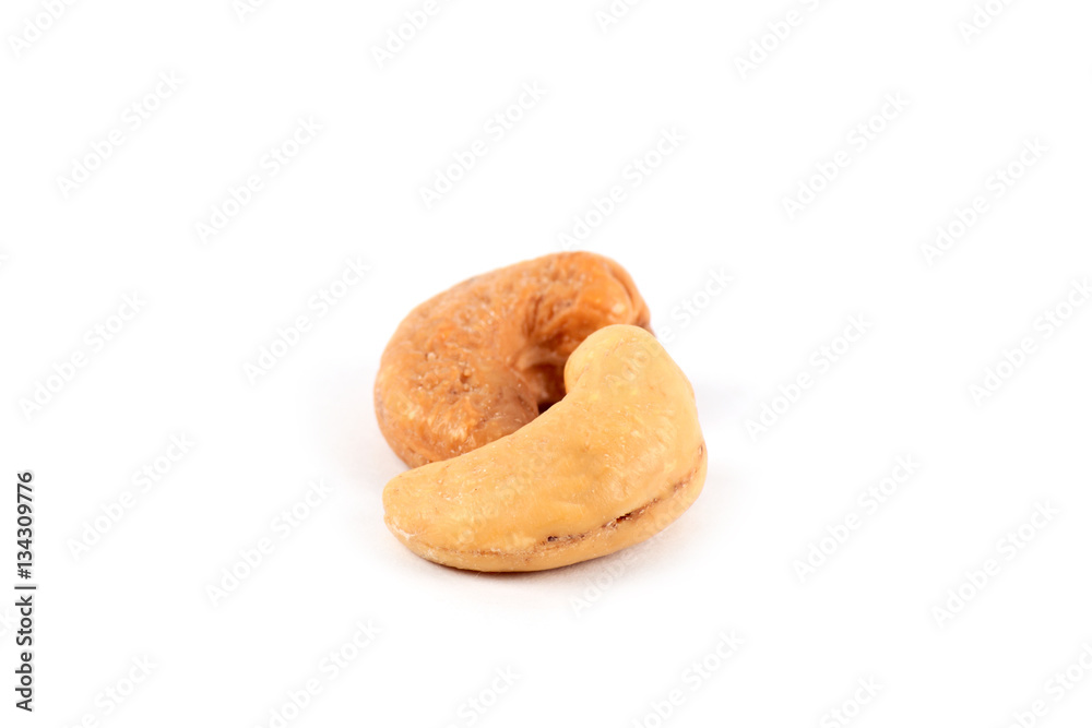 Roasted cashews isolated on white