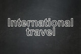 Vacation concept: International Travel on chalkboard background