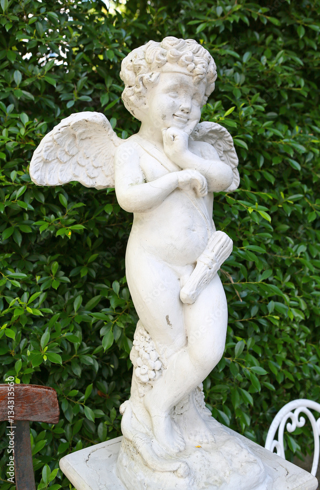 Cupid sculpture in the garden