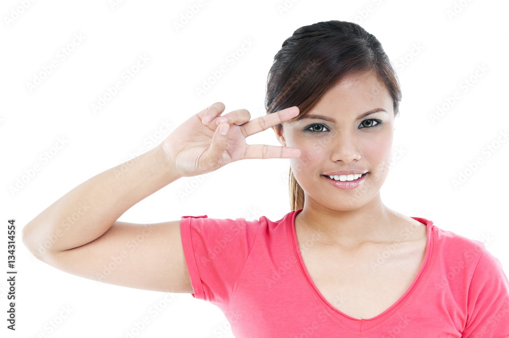 Young Woman Showing Peace Gesture Young Woman Showing Peace Gesture