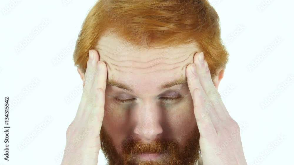 Headache, frustrated Red Hair Beard Man Close Up