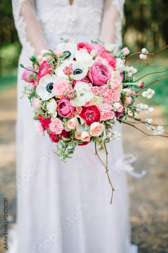 Beauty wedding bouquet in bride s hands