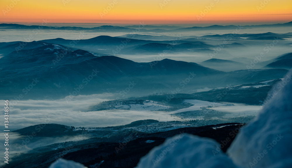 Above the clouds - beautiful winter landscape on a mountain top
