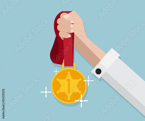 gold medal hold in hand