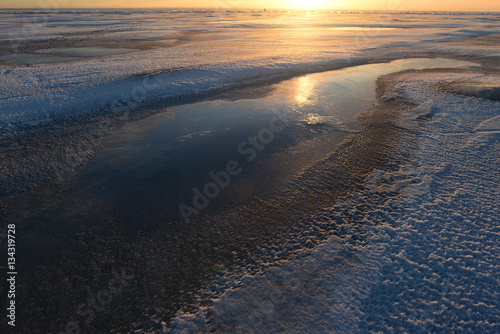 Ice desert at sunset winter sun natural beauty