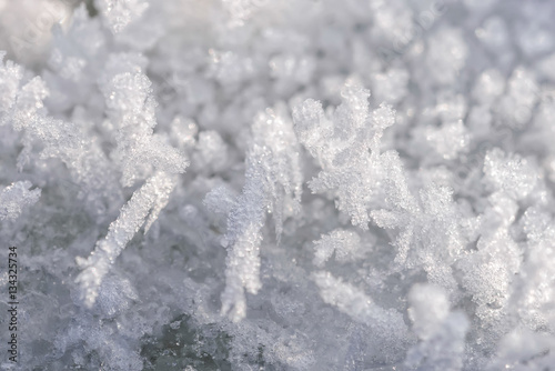 Detail of frozen icy snow during winter