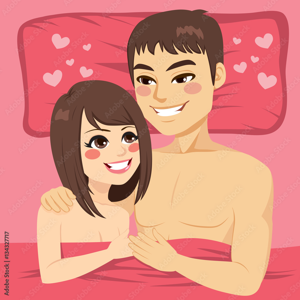 Young romantic couple in bed on Valentine day Young romantic couple in bed on Valentine day
