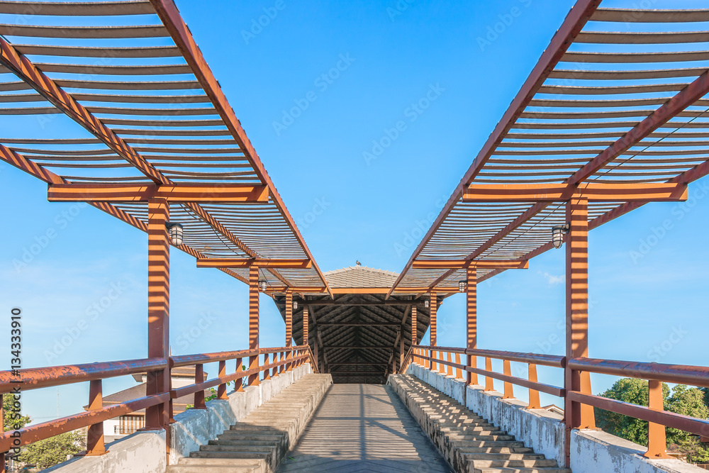a public bridge at Samchuk Market with a blue sky background.