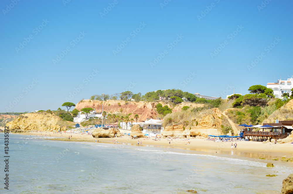 Algarve Portugal - 24 August 2016: Beach near Olhos de Agua in Albufeira region, sunny blue sky background outdoors