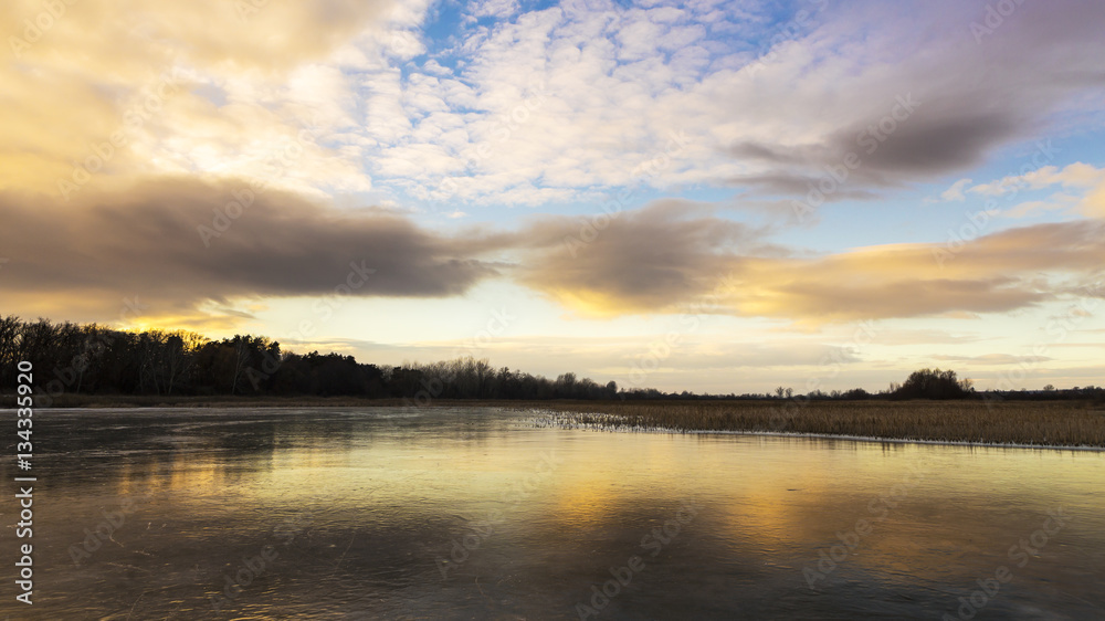 Frozen lake in winter beautiful colors.