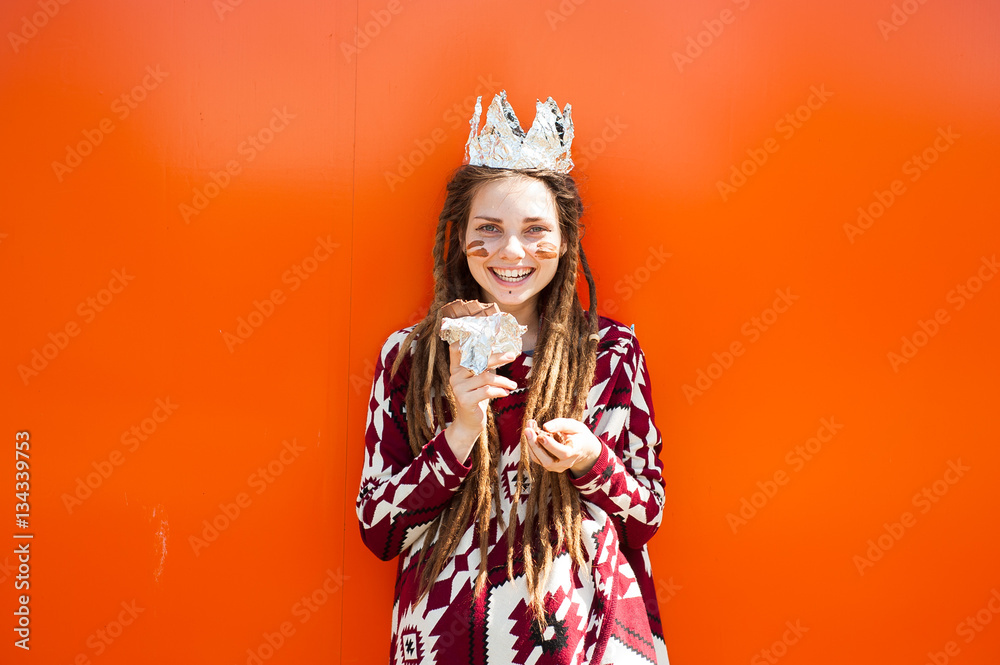 Obraz premium Colorful fashion photos with beautiful girl, she eats a chocolat