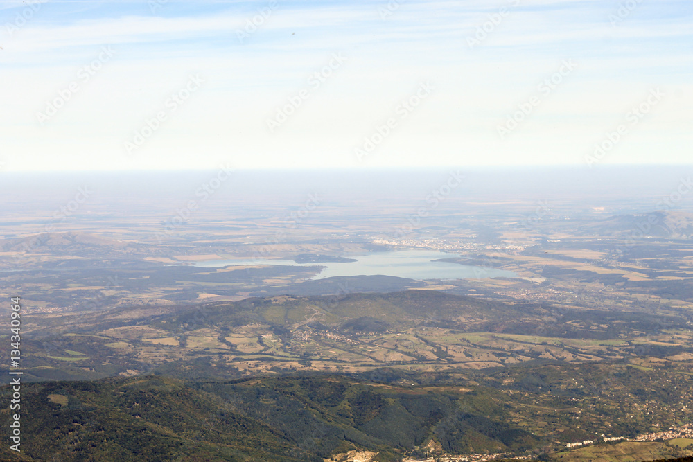 Amazing aerial view from mountain, lake or dam in the background