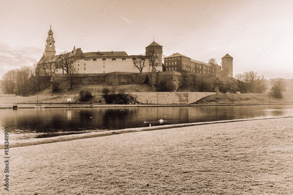 Wawel royal medieval castle on the Vistula (Wisla) river, retro vintage style image, Krakow, Poland, Eastern Europe
